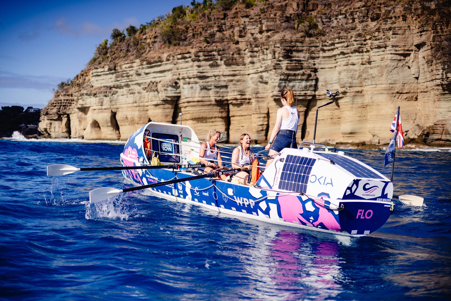 Three women on a row boat Three women on a row boat