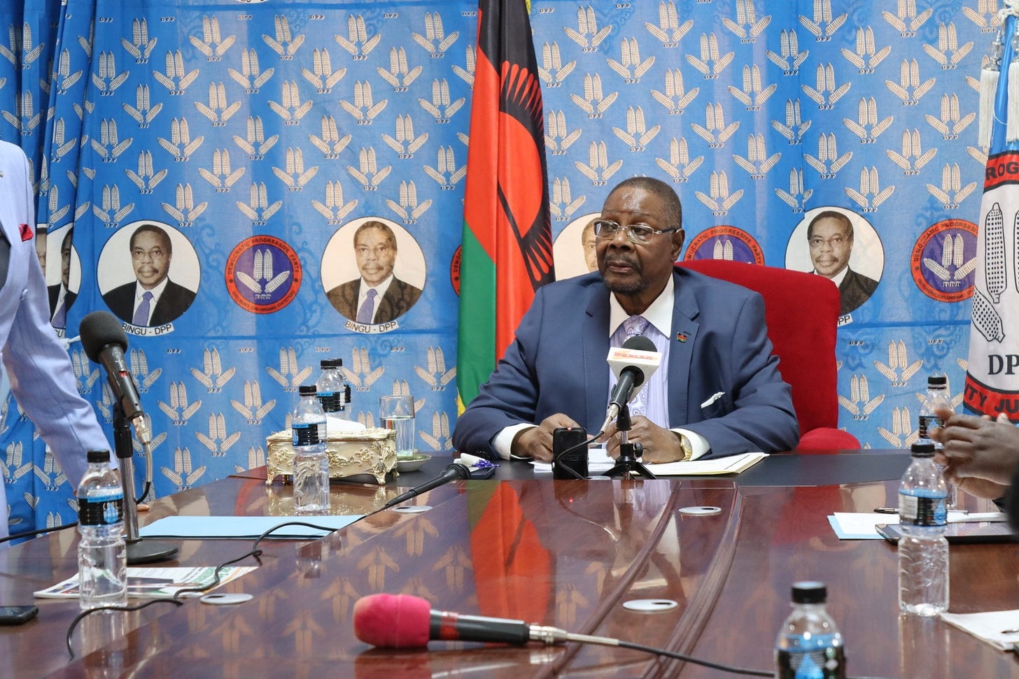 May be an image of 5 people, people sitting and people standing