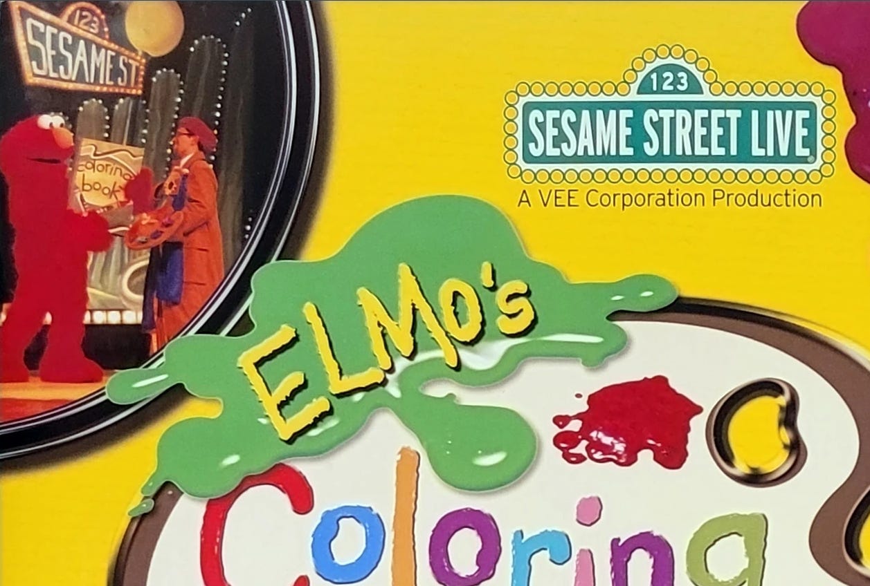 The program cover of Sesame Street Live: Elmo's Coloring Book.