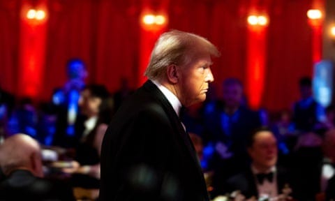 Trump, in suit and tie, prepares to speak during an America First Policy Institute gala at his Mar-a-Lago estate in November.
