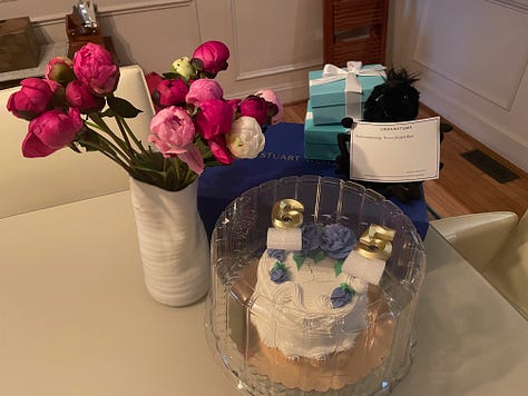 Photos of cakes, jewelry, flowers, Laura Lippman in a sweater dress, and a woman blowing out candles.