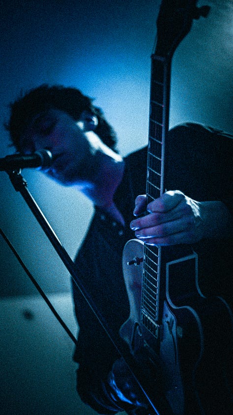 a bunch of rad photos with a rad rock band Kasador, and their fans in an underground house party in Calgary