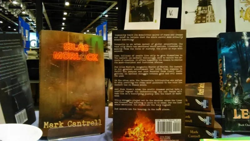 silas morlock displayed at a book event