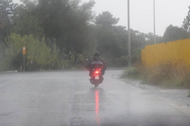 3,200+ Motorcycle Rain Stock Photos, Pictures & Royalty-Free Images -  iStock | Motorcycle racing, Vespa, Motorcycle sad