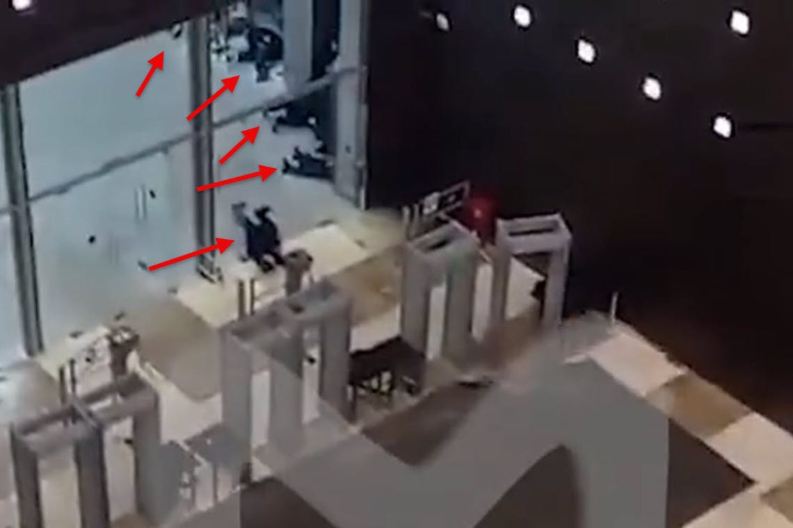 Gunmen in combat fatigues open fire at Moscow concert hall, 50 dead, 50 injured reported. Hall is on fire, roof collapsing Gunmen in combat fatigues open fire at Moscow concert hall, 50 dead, 50 injured reported. Hall is on fire, roof collapsing