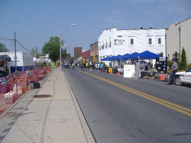 A whole row of City of Salisbury work vehicles were parked along the side of Market Street. A whole row of City of Salisbury work vehicles were parked along the side of Market Street.