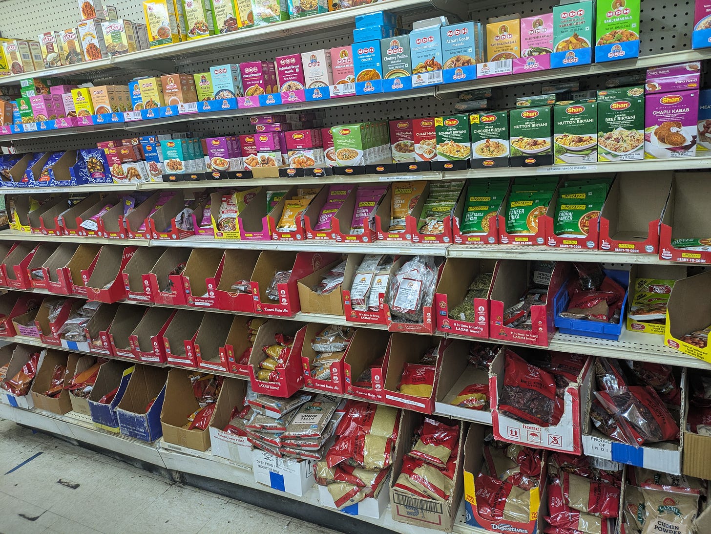 Spice wall at India A1 Grocery in Arlington where I scored my cardamom pods and the ghee I used instead of butter.