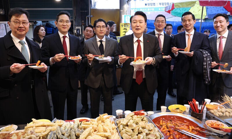 Why heads of Korea's chaebol ate tteokbokki with Yoon