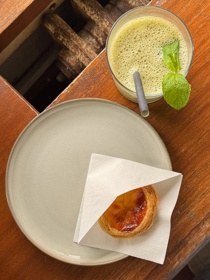 Views over Lisbon, pastel de nata and matcha.