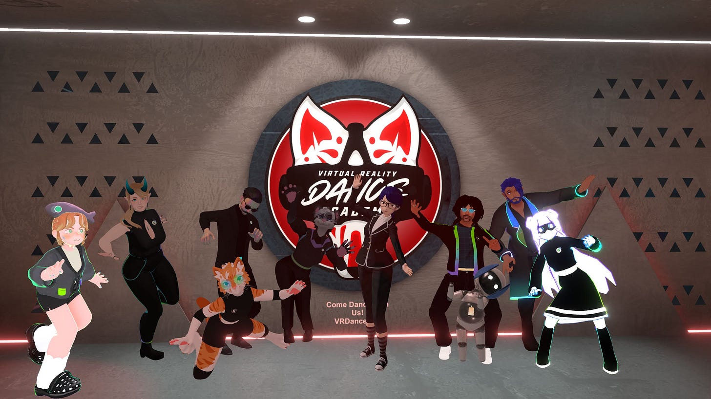 This is an image of the Glitches.VR Collective striking funny poses with Instructor Mycana after the end of class.