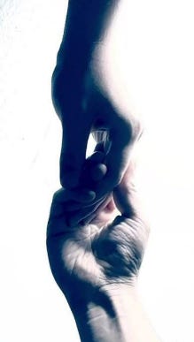 A close-up of a hand holding a finger

AI-generated content may be incorrect.