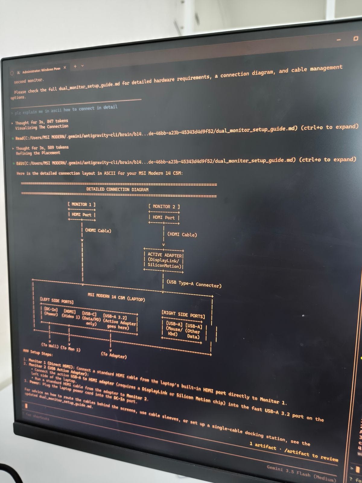 View of the external monitor showing the AI coding assistant's terminal output and connection diagram. View of the external monitor showing the AI coding assistant's terminal output and connection diagram.