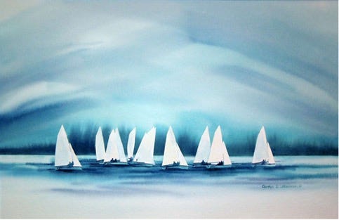 A group of sailboats in the water

Description automatically generated