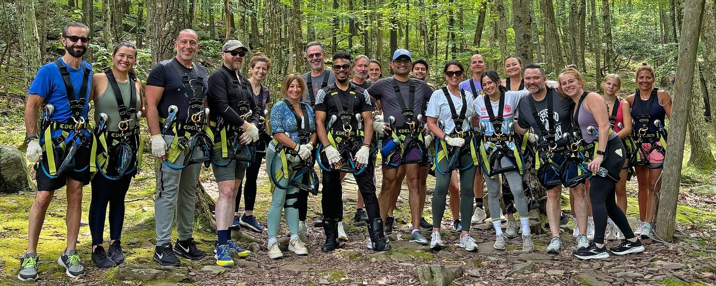 A group of people posing for a photo

AI-generated content may be incorrect.