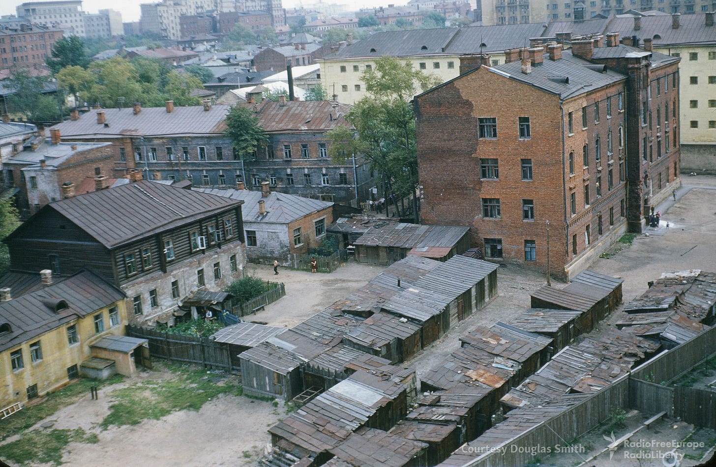 Rustic log-topped housing and ramshackle sheds with corrugated steel, revealing lesser-seen residential areas in Moscow’s Tagansky raion. Rustic log-topped housing and ramshackle sheds with corrugated steel, revealing lesser-seen residential areas in Moscow’s Tagansky raion.