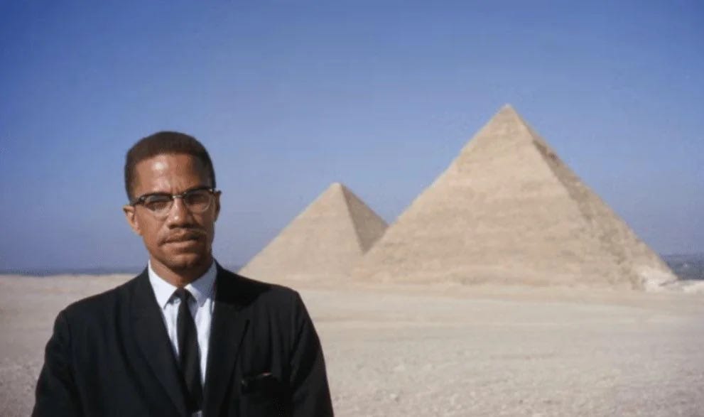 malcolm-x-visiting-the-great-pyramids-during-his-pilgrimage-v0-taba73t00iy81.jpg.webp malcolm-x-visiting-the-great-pyramids-during-his-pilgrimage-v0-taba73t00iy81.jpg.webp