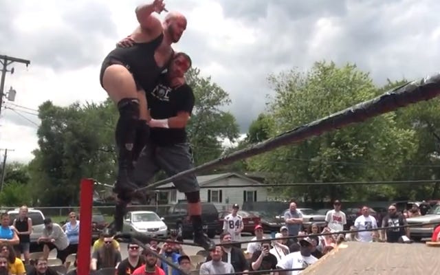 [Screenshot: Reed Bentley and Devon Moore on the top rope]