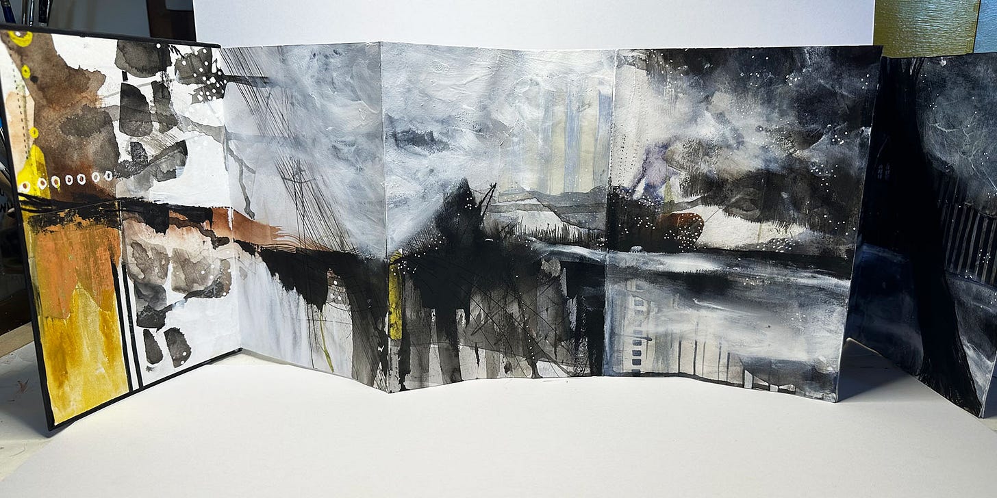 Sketchbook pages with abstractions in mixed media