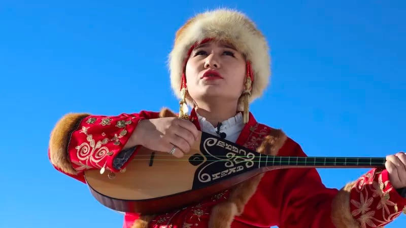 Sayagul Birlesbek plays domra, a lute-like instrument popular in Eastern Europe and Central Asia. Sayagul Birlesbek plays domra, a lute-like instrument popular in Eastern Europe and Central Asia.