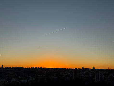 Scenes from Madrid at Christmas, including lights, markets, churros, decorations, and city streets at night.