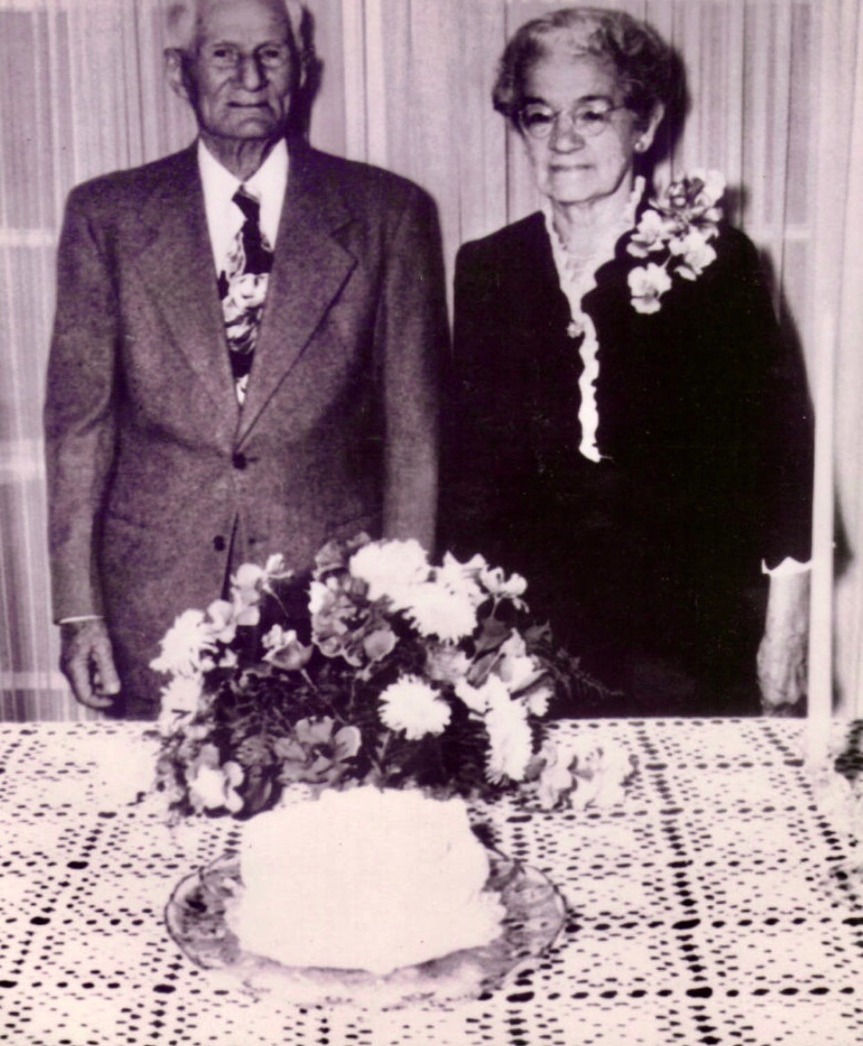 Elderly couple celebrating 75 years together.