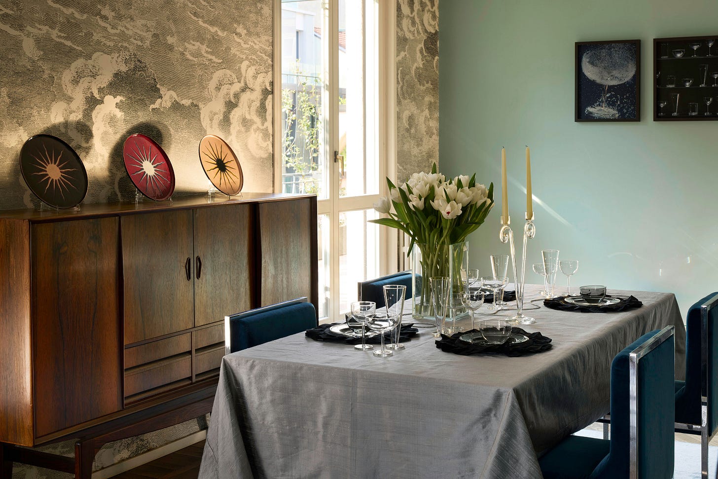 A dining room table set with Sophie Lou Jacobsen's Disco Aperitivo collection A dining room table set with Sophie Lou Jacobsen's Disco Aperitivo collection