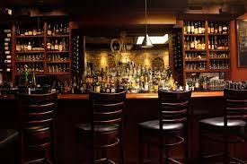 A picture containing text, indoor, ceiling, bar

Description automatically generated