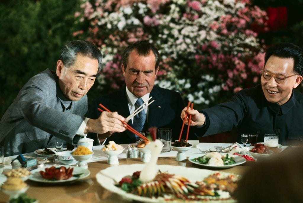 US president Richard Nixon dines with Chinese premier Zhou Enlai (left) and Shanghai Communist Party leader Zhang Chunqiao on February 27, 1972. Photo: Getty Images
