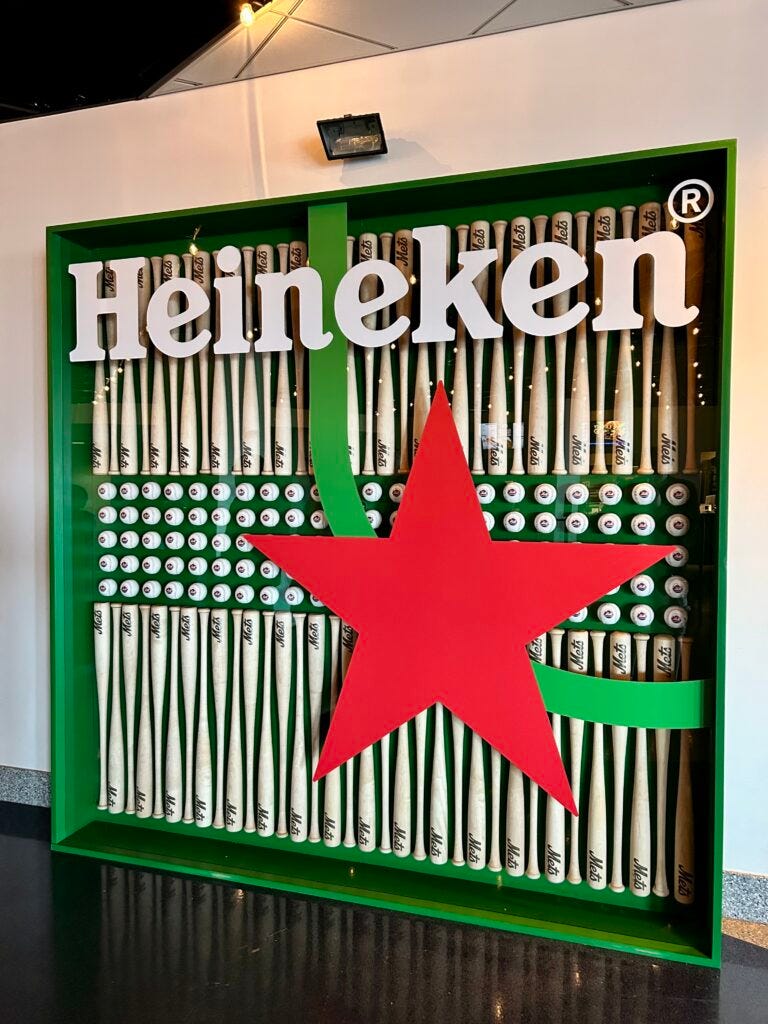 Sign, baseballs, bats