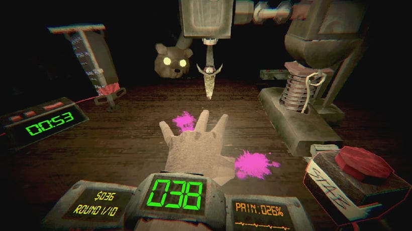 A hand is strapped beneath a knife that has already chopped off a ring finger and a thumb