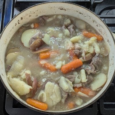 picture of stew in bowl and pot