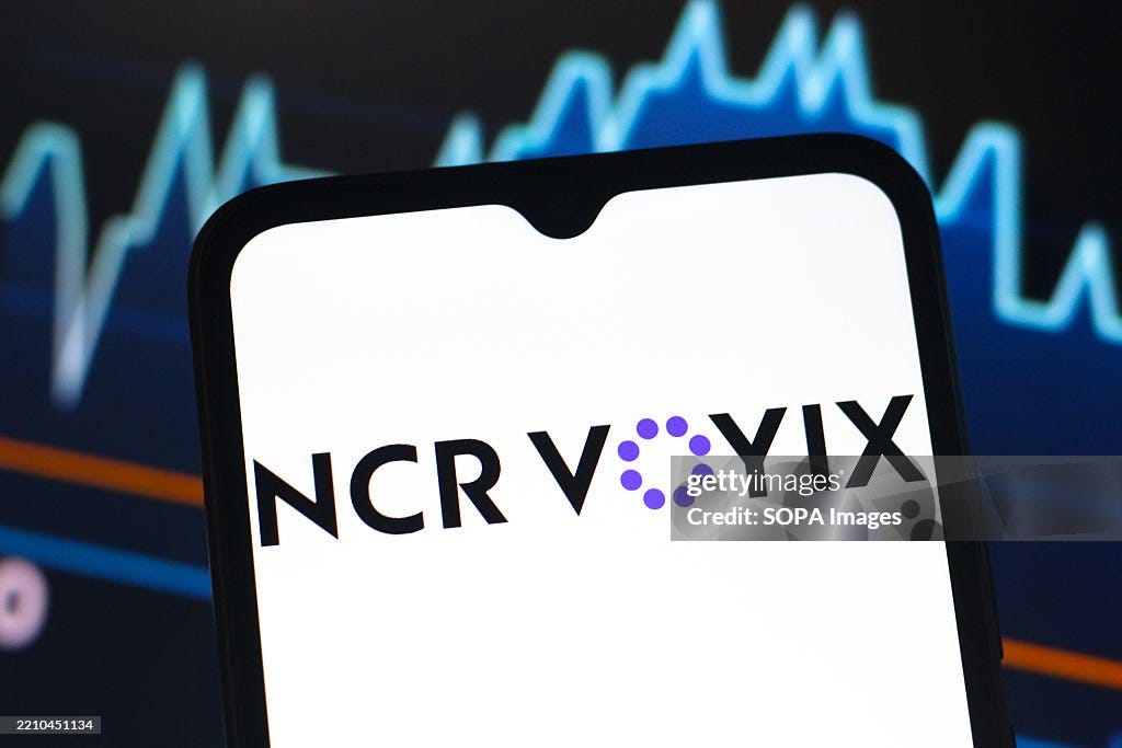 In this photo illustration, the NCR Voyix Corporation logo is seen... News Photo - Getty Images In this photo illustration, the NCR Voyix Corporation logo is seen... News Photo - Getty Images