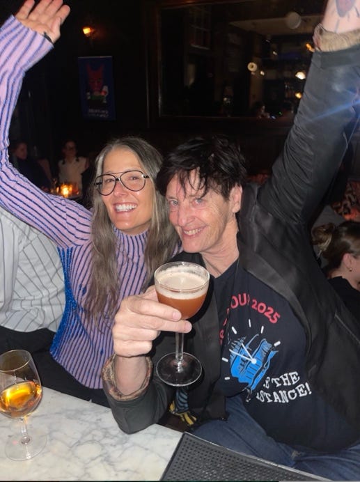 A person and person holding drinks

AI-generated content may be incorrect.