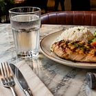 Ajuste no Cardápio, Tesla Despenca, IA no Irã e Padaria de US$ 300 Milhões