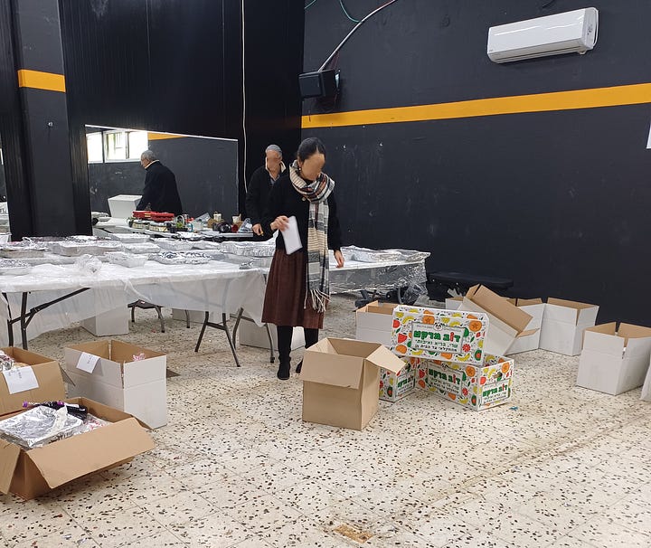 Boxes, table of wrapped food, Sabbath ritual items 