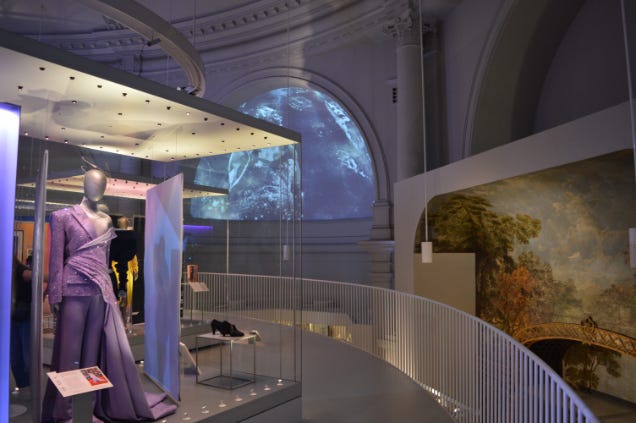 Lil Nas X's beautiful lilac suit dress on left and rotunda on right