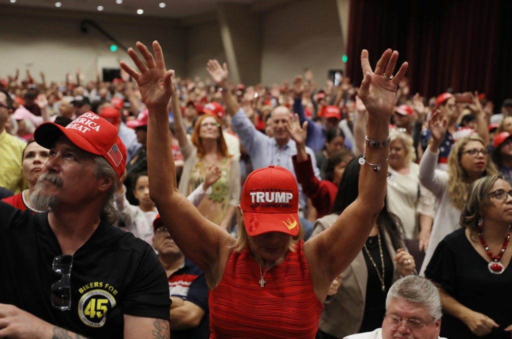 Fran Flynn (C) prays during the 'Evangelicals for Trump' campaign event held at the King Jesus International Ministry as they await the arrival of President Donald Trump on January 03, 2020 in Miami, Florida. The rally was announced after a December editorial published in Christianity Today called for the President Trump's removal from office. (Photo by Joe Raedle/Getty Images) Fran Flynn (C) prays during the 'Evangelicals for Trump' campaign event held at the King Jesus International Ministry as they await the arrival of President Donald Trump on January 03, 2020 in Miami, Florida. The rally was announced after a December editorial published in Christianity Today called for the President Trump's removal from office. (Photo by Joe Raedle/Getty Images)