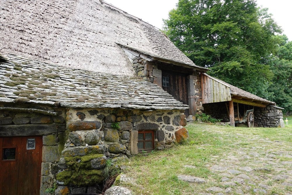Traditional French Village House with Thatched Roof in Moudeyres Village Traditional French Village House with Thatched Roof in Moudeyres Village