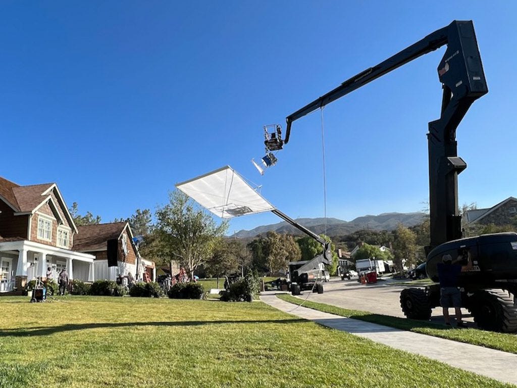 Lighting cranes known as condors on a movie set