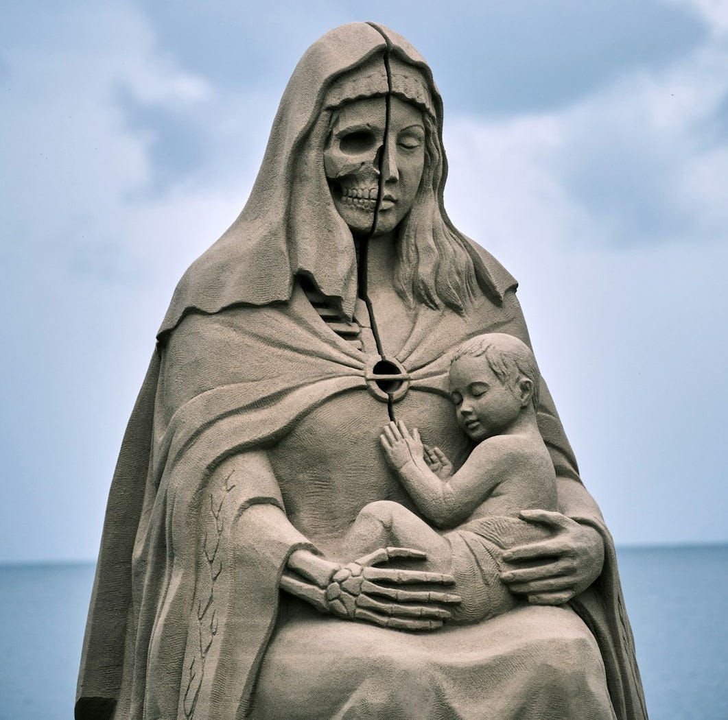 gray concrete statue under blue sky during daytime