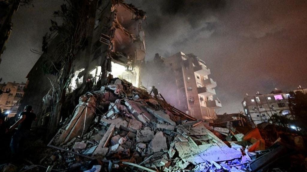 Rescue personel work at a residential building following missile attack from Iran on Israel Rescue personel work at a residential building following missile attack from Iran on Israel