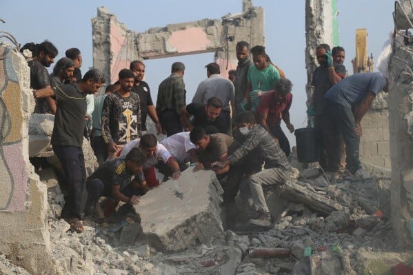 Rescue workers and residents search through the rubble in the aftermath of what Iranian officials said was an Israeli-U.S. strike on a girls' elementary school in Minab, Iran, Saturday, Feb. 28, 2026. (Abbas Zakeri/Mehr News Agency via AP) Rescue workers and residents search through the rubble in the aftermath of what Iranian officials said was an Israeli-U.S. strike on a girls' elementary school in Minab, Iran, Saturday, Feb. 28, 2026. (Abbas Zakeri/Mehr News Agency via AP)