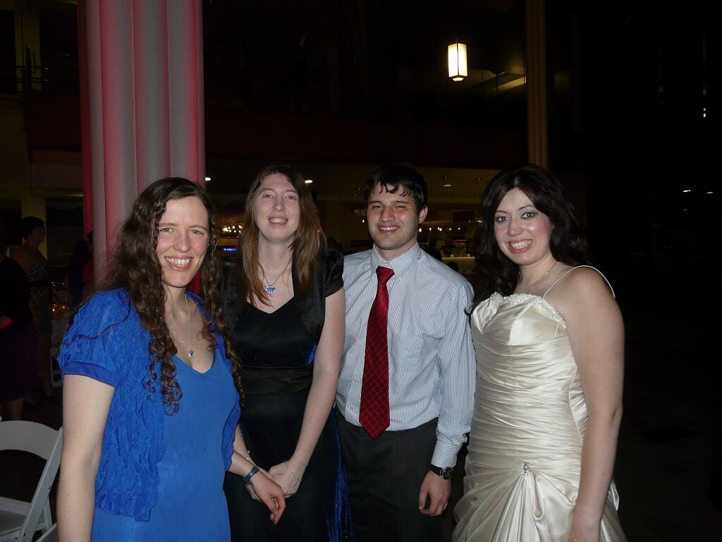 Lady Vulpix (left) at her friend's wedding, with other members of The PokéMasters (2012)
