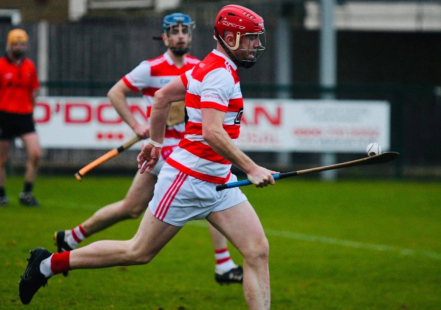 May be an image of hockey and text May be an image of hockey and text