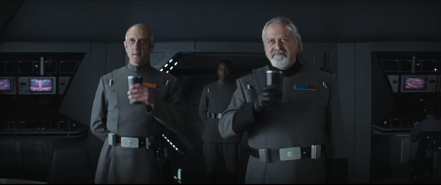 Two Galactic Empire stooges in Nazi-like uniforms drinking coffee from precursors to Stanley Cups
