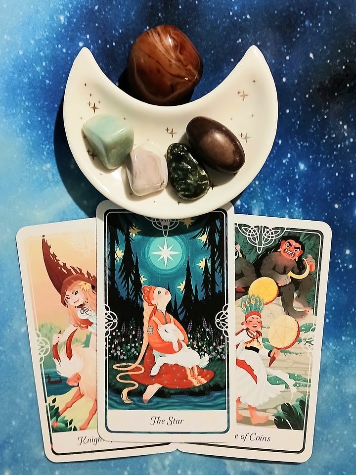 Tarot of the divine cards on a starry blue background