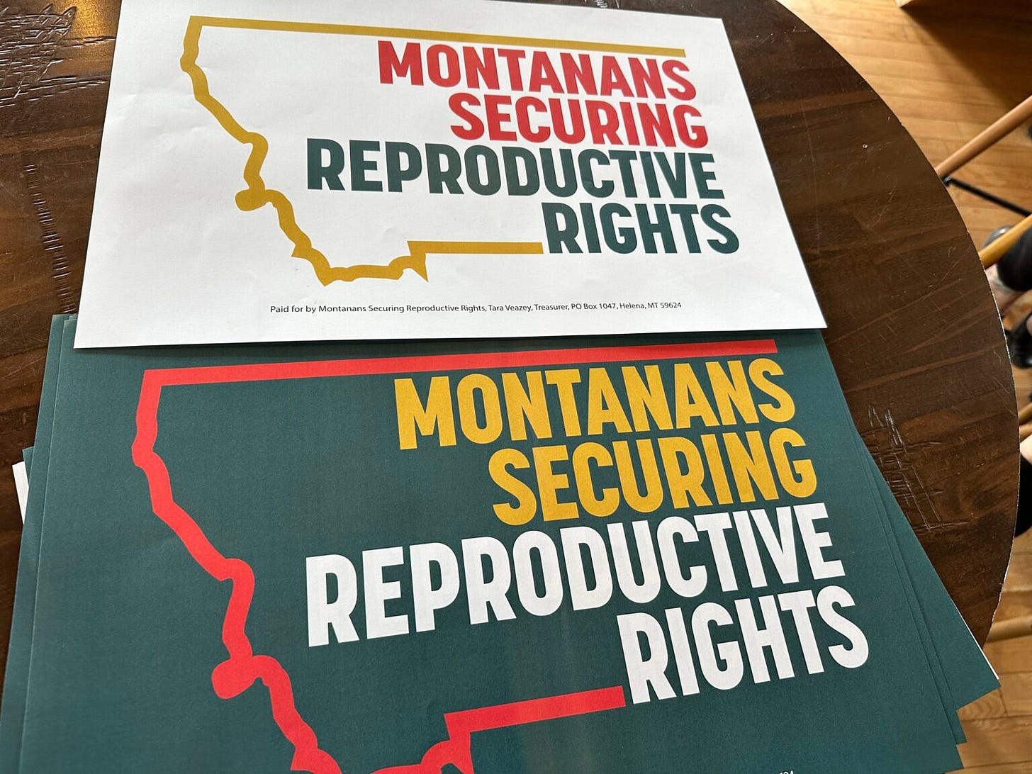 Posters for Montanans Securing Reproductive Rights, the group behind CI-128 in 2024. (Photo by Blair Miller, Daily Montanan) Posters for Montanans Securing Reproductive Rights, the group behind CI-128 in 2024. (Photo by Blair Miller, Daily Montanan)