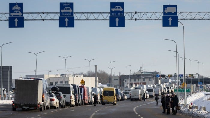 A queue of buses and passenger cars at the Polish-Ukrainian border crossing at Medyka A queue of buses and passenger cars at the Polish-Ukrainian border crossing at Medyka