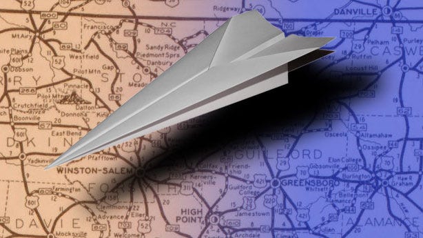 Paper airplane over Greensboro and Winston-Salem Paper airplane over Greensboro and Winston-Salem