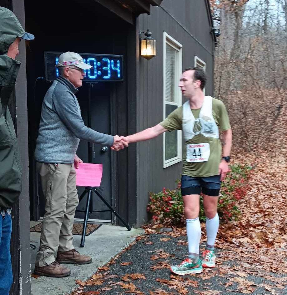 Me shaking Dr. Horton's hand at the finish
